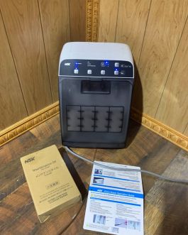 NSK iCare 3 Dental Handpiece Lubricator Machine with 4 Ports.